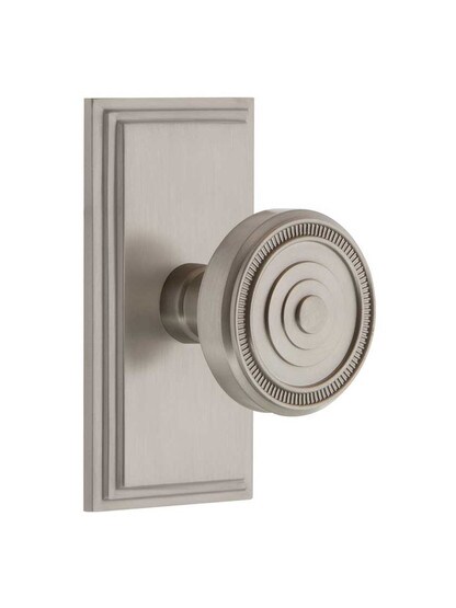 Grandeur Carre Rosette Door Set with Soleil Knobs in Satin Nickel.